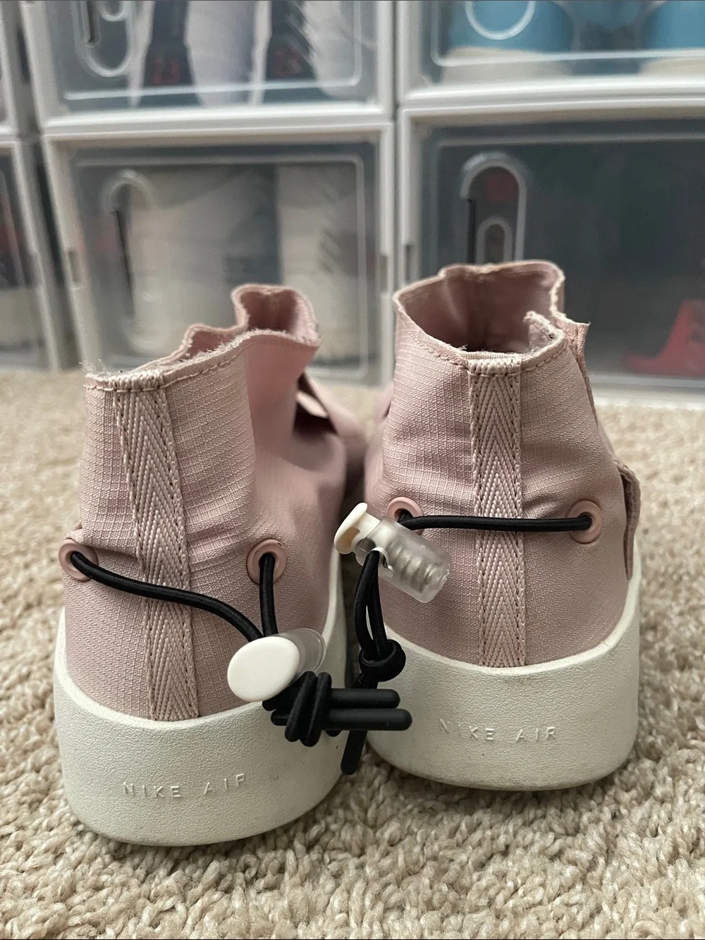 Nike Light Pink Slip-On Sneakers with Black Swoosh